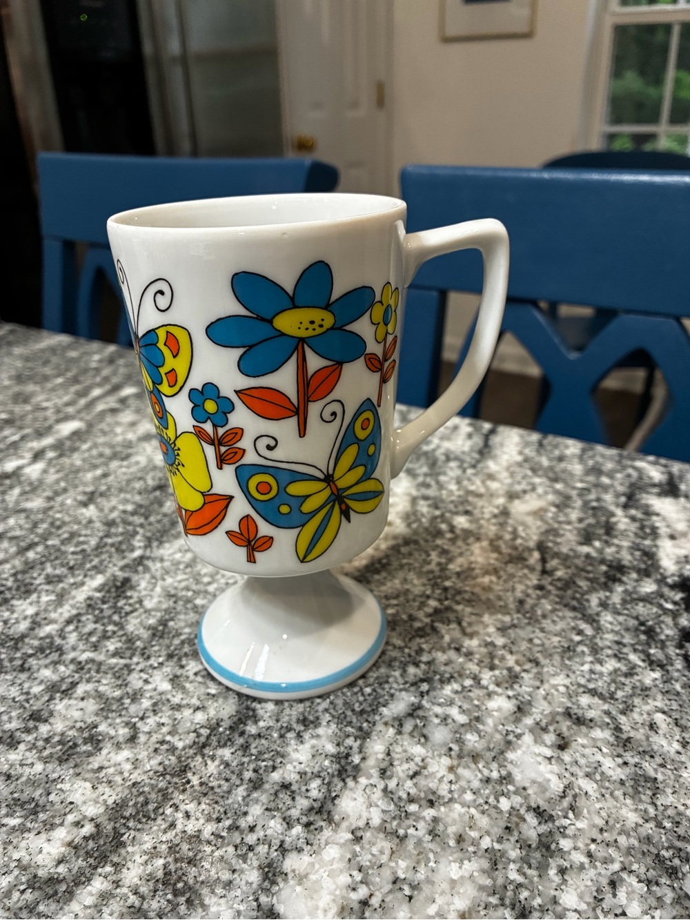 Vintage butterfly flower power footed mug